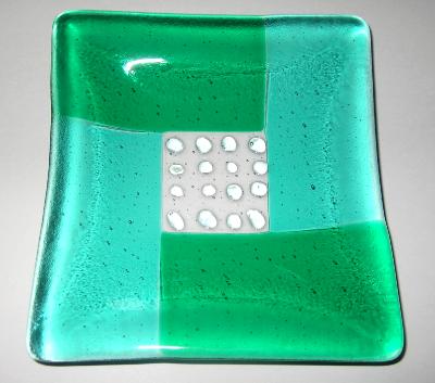 Green, turquoise, and clear garlic and oil plate