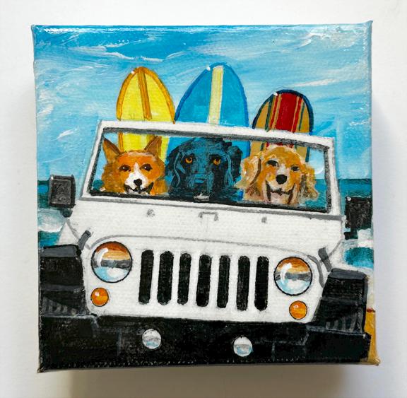 THREE SURFDOGS HIT THE BEACH