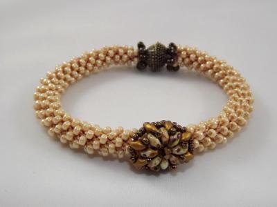 B-31 ecru crocheted rope bracelet with flower slide B-31 ecru crocheted rope bracelet with flower slide