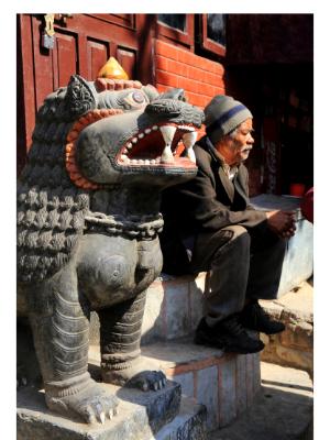 Old Man with Lion in Durbar Square Old Man with Lion in Durbar Square