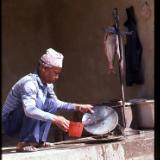 Nepalese man selling fish