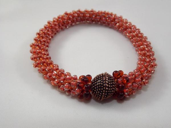 B-67 muted orange crocheted rope bracelet