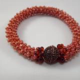 B-67 muted orange crocheted rope bracelet