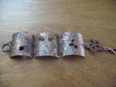 13-045 Etched and Pierced heat stained floral copper bracelet