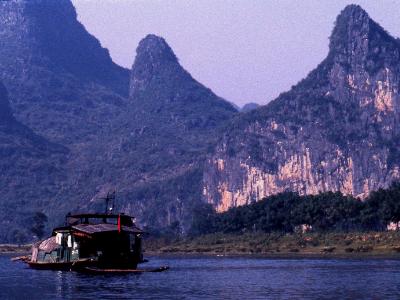 Chinese Commune boat, distant mountains Chinese Commune boat, distant mountains