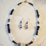 Dark tinted and White glass with antique silver beads          White mesh center ornament 