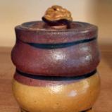 Brown and Dark Cream Colored Lidded Pot 
