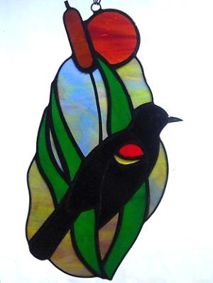 Red-winged Blackbird with free-form Sunset Background Red-winged Blackbird with free-form Sunset Background