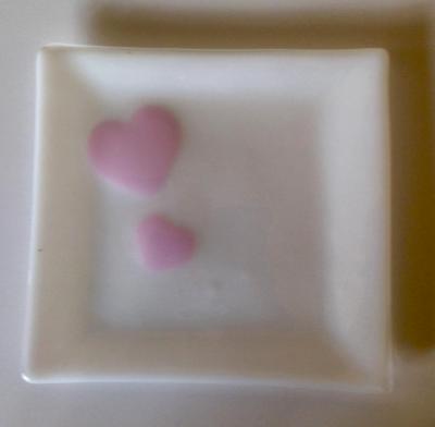 White plate with pink hearts 9x9