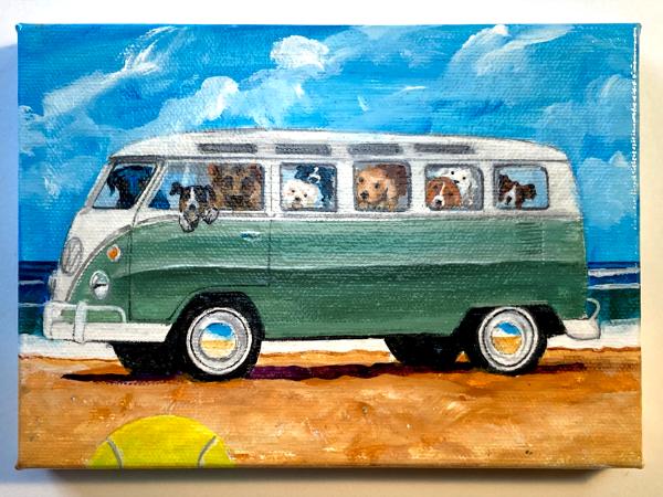 BUSFULL OF DOGS HIT THE BEACH 