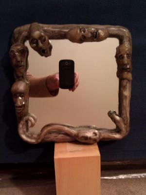 mirror with spooky frame