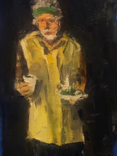 Homeless Man Eating at Presidio Park Meal Event