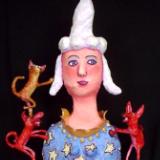Miss Josephine Considers Introducing a Wild Cat Into Her Red Dog Act