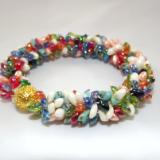 B-42 ivory, red, blue, peach, green, & orange spikey bracelet