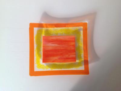 Platter with orange and yellow rim, orange center Platter with orange and yellow rim, orange center