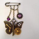 Bar pin , Key and charms with cat's eye