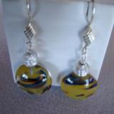 #64 brown murano with silver