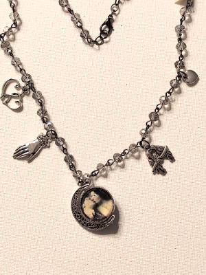 Sweetheart spinner and charms necklace