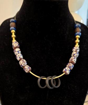 Hand painted beads with brass accents Hand painted beads with brass accents