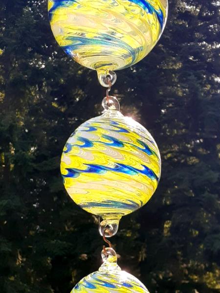 #08262502 Four Hanging Ball Sculpture SeaHawk Colors LG-6.5'' Med-5.25'' Sm-3.5'' Long 31.5'' $250.00