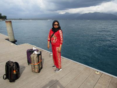 Dockside with luggage on Gili Air island Dockside with luggage on Gili Air island
