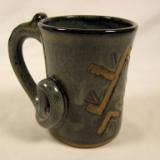 110915.O Carved Coffee Mug with Tail Handle
