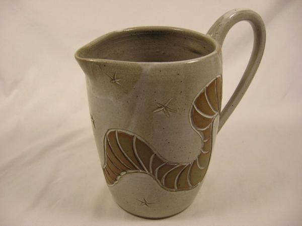 110731.A White Glazed Pitcher with Carved Design