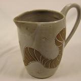 110731.A White Glazed Pitcher with Carved Design