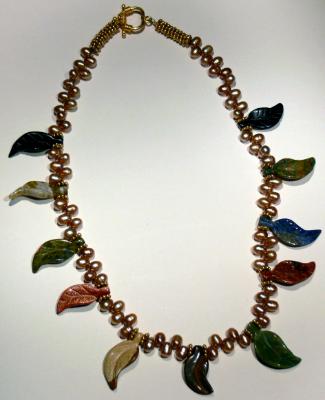 Multi colored carved gemstone leaves and freshwater pearl necklace