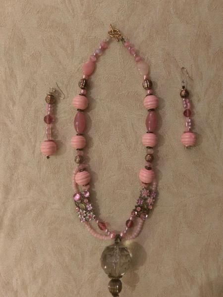 Pink set in glass and wood beads
