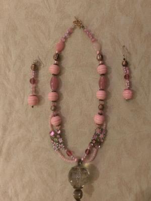 Pink set in glass and wood beads