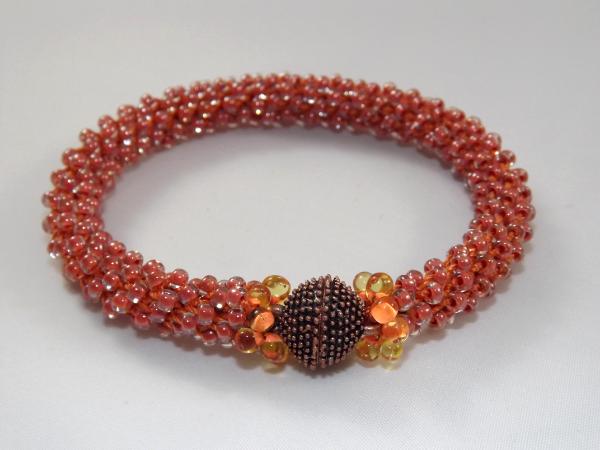 B-75 orange crocheted rope bracelet