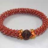 B-75 orange crocheted rope bracelet