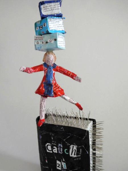 Catch 22 pins card sculpture