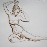 Seated Woman Adjusting Her Hair
