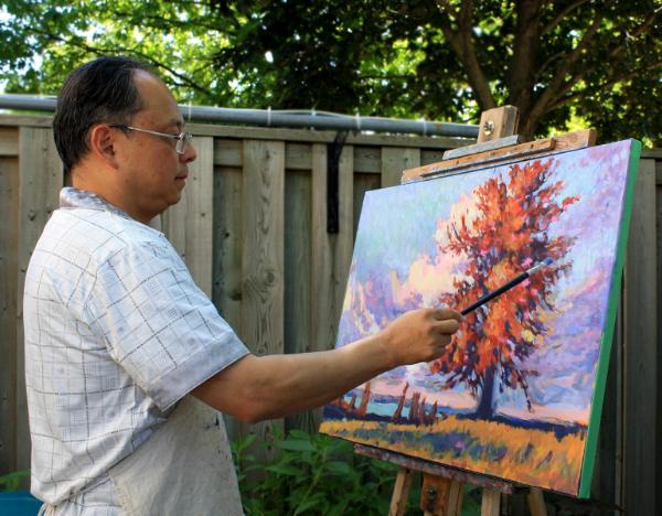Jimmy Sun is working on his painting