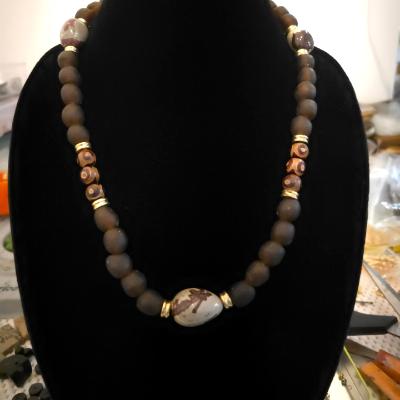 African glass, tibetian glass with brass accents African glass, tibetian glass with brass accents