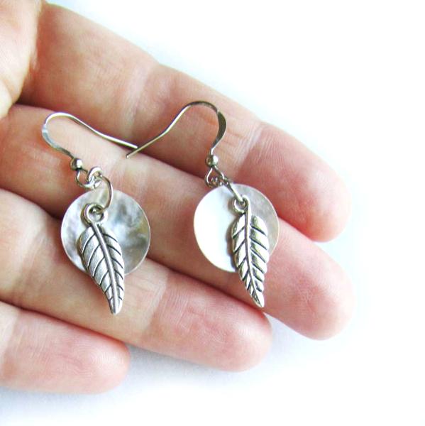 Shell feather silver tone earrings