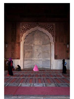 Woman praying at the Mosque Woman praying at the Mosque