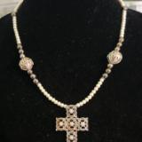 Cross with  pearl studs