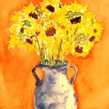blue vase with sunflowers