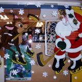 Santa & Rudolf playing hockey