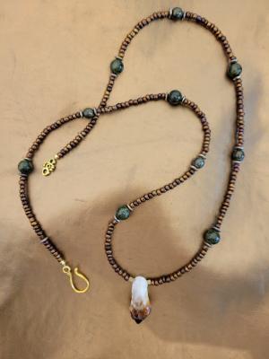 Rough cut amber and quartz pendanr w/glass seed beeds Rough cut amber and quartz pendanr w/glass seed beeds